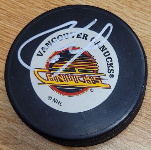 Autographed CAM NEELY Vancouver Canucks Hockey Puck