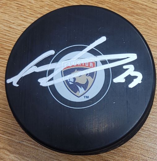 Autographed EETU LUOSTARINEN Florida Panthers Hockey Puck