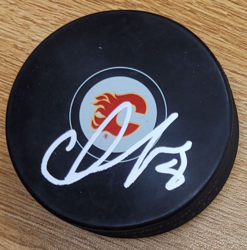 Autographed CHRISTOPHER TANEV Calgary Flames Hockey Puck