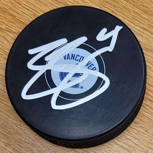 Autographed JORDIE BENN Vancouver Canucks Hockey Puck