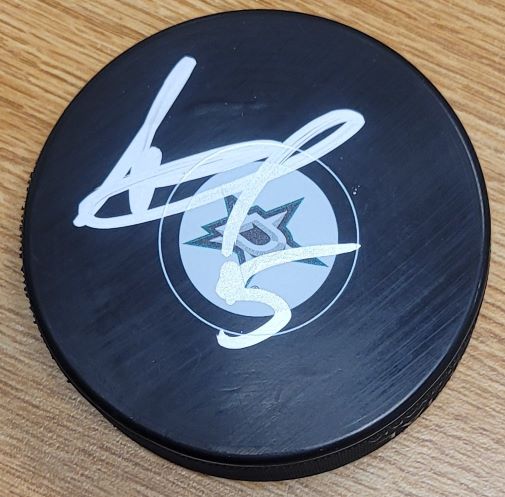 Autographed ANDREJ SEKERA Dallas Stars Hockey Puck