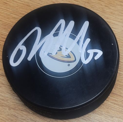 Autographed RICKARD RAKELL Anaheim Ducks Hockey Puck