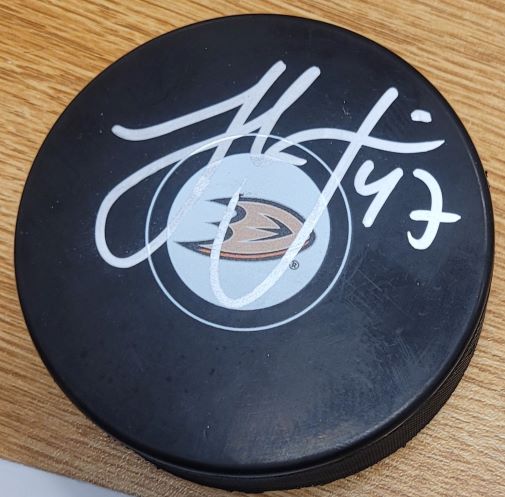 Autographed HAMPUS LINDHOLM Anaheim Ducks Hockey Puck