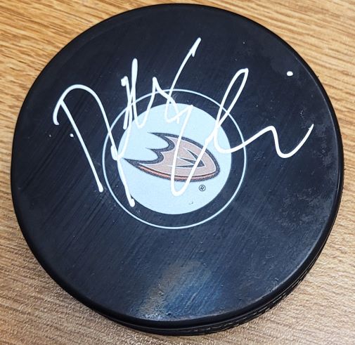 Autographed DALLAS EAKINS Anaheim Ducks Hockey Puck