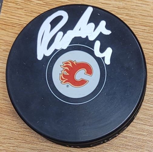 Autographed RASMUS ANDERSSON Calgary Flames Hockey Puck
