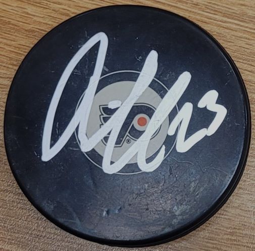 Autographed OSKAR LINDBLOM Philadelphia Flyers Hockey Puck
