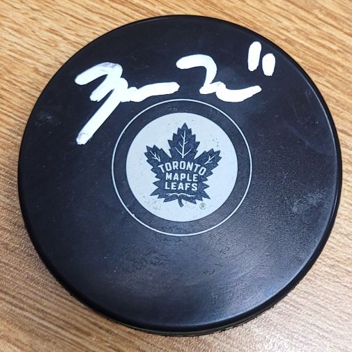 Autographed ZACH HYMAN Toronto Maple Leafs Hockey Puck