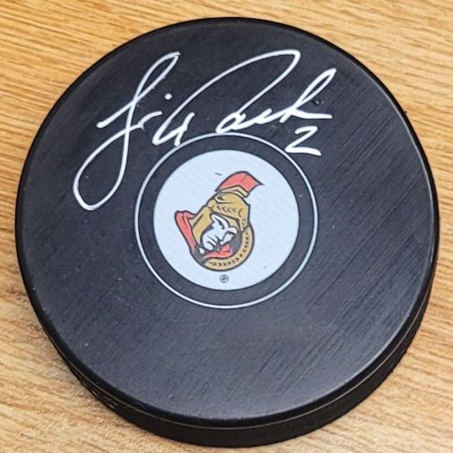 Autographed JIM PAEK Ottawa Senators Hockey Puck