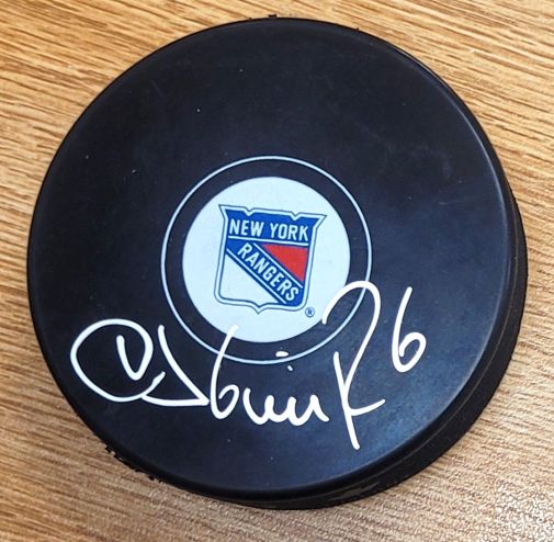 Autographed DARIUS KASPARAITIS New York Rangers Hockey Puck