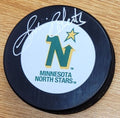 Autographed GORDIE ROBERTS Minnesota North Stars Hockey Puck