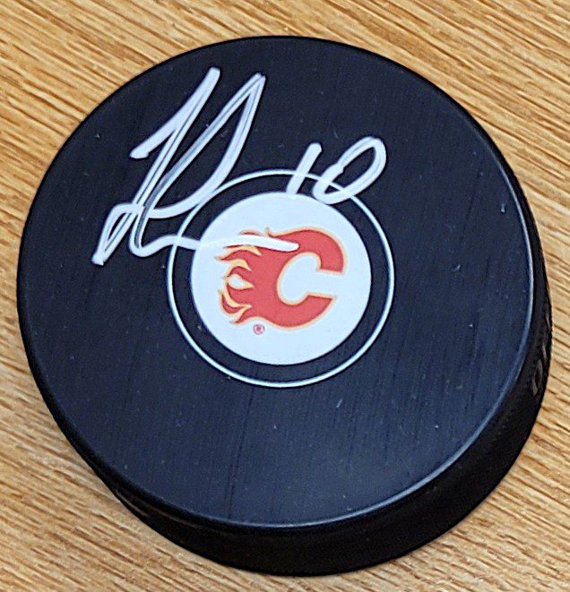 Autographed JONATHAN HUBERDEAU Calgary Flames Hockey Puck