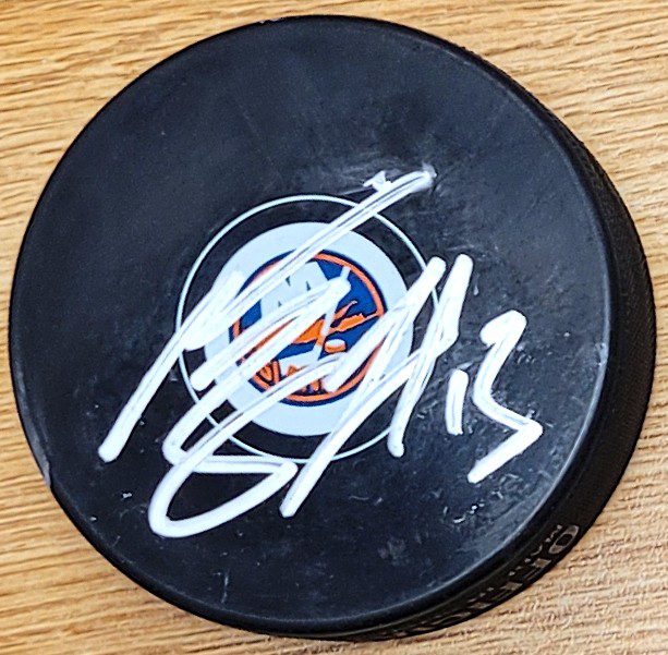 Autographed MATHEW BARZAL New York Islanders Hockey Puck