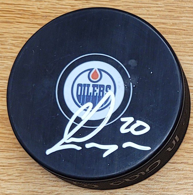 Autographed CURTIS LAZAR Edmonton Oilers Hockey Puck