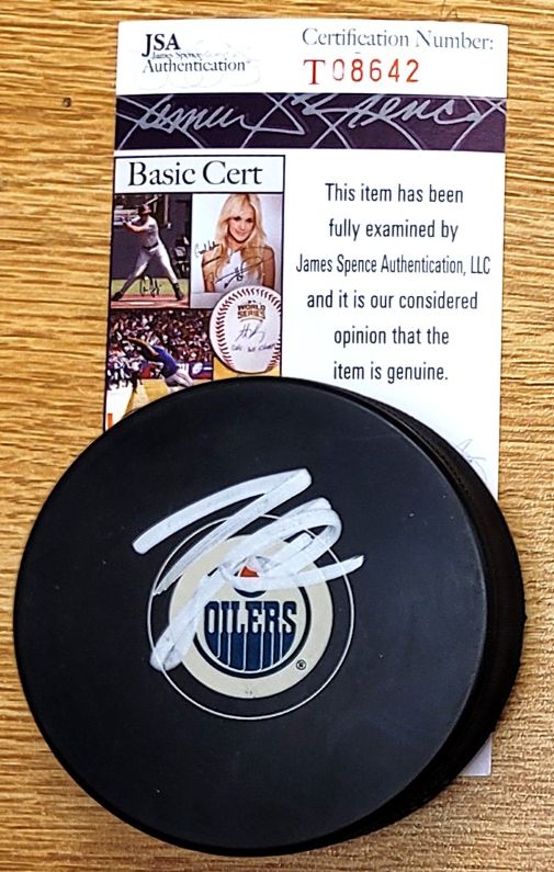 Autographed TAYLOR HALL Edmonton Oilers Hockey Puck JSA