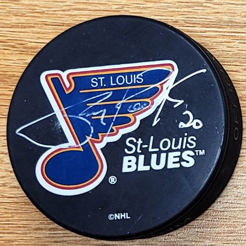Autographed RUDY POESCHEK St. Louis Blues Hockey Puck