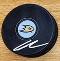 Autographed LEO CARLSON Anaheim Ducks Hockey Puck