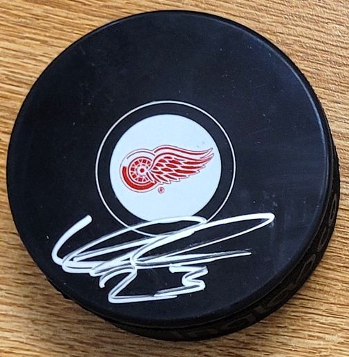 AUTOGRAPHED LUCAS RAYMOND Detroit Red Wings Hockey Puck