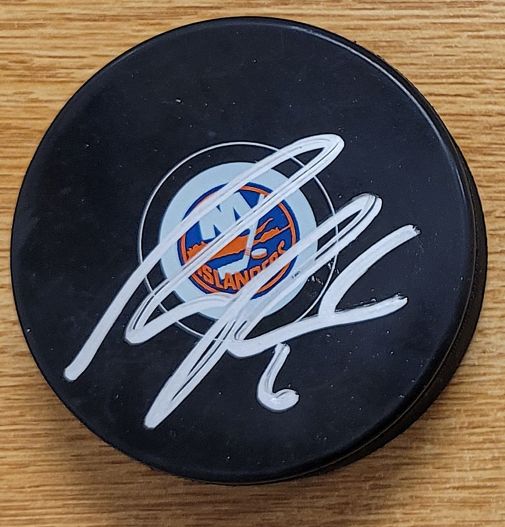 Autographed RYAN PULOCK New York Islanders Hockey Puck