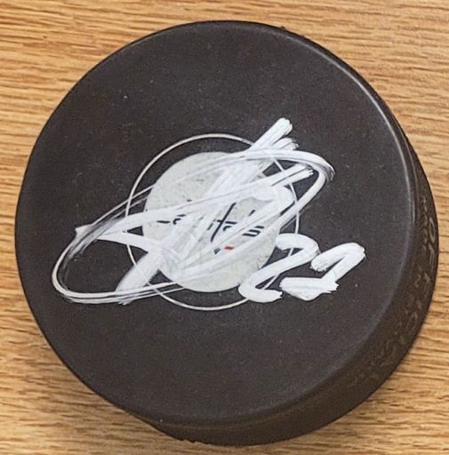 Autographed ALEXANDER ALEXEYEV Washington Capitals Hockey Puck