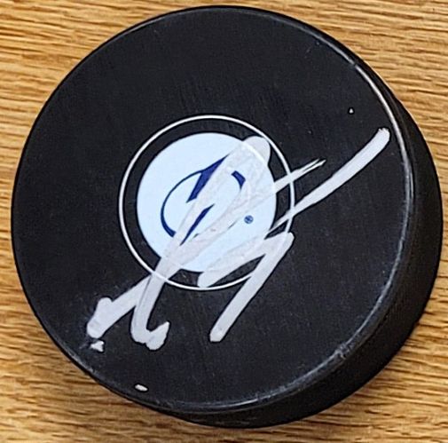 Autographed LOUIS DOMINGUE Tampa Bay Lightning Hockey Puck