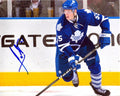 Autographed  KORBINIAN HOLZER 8X10 Maple Leafs  photo