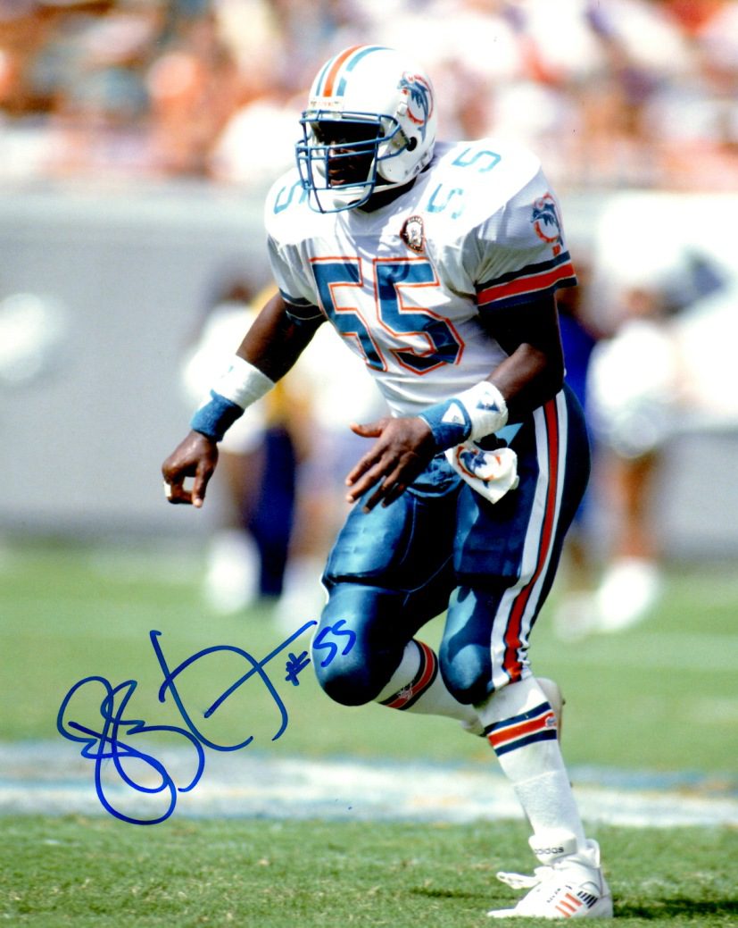 Autographed  HUGH GREEN 8X10 Miami Dolphins  photo