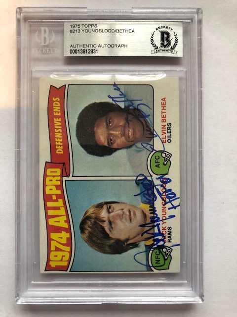 Autographed 1975 Topps Jack Youngblood and Elvin Bethea card #213 Beckett Slabbed