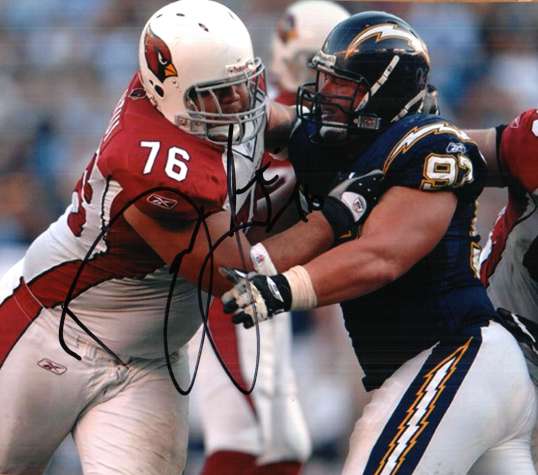 Autographed DEUCE LUTUL photo Arizona Cardinals