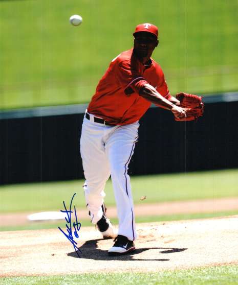 AUTOGRAPHED ALEXI OGANDO 8X10 photo  Texas Rangers