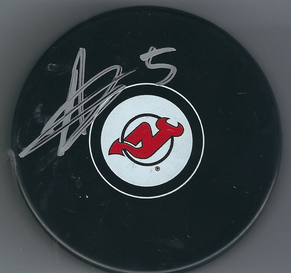 Autographed ADAM LARSSON New Jersey devils Hockey Puck