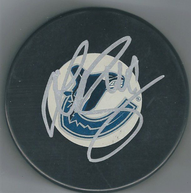 Autographed SVEN BAERTSCHI Vancouver Canucks Hockey Puck