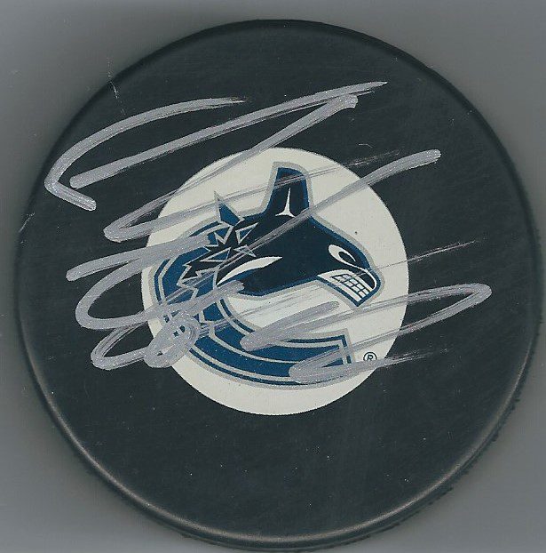 Autographed  THOMAS VANEK Vancouver Canucks Hockey Puck
