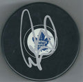 Autographed LEO KOMAROV Toronto Maple Leafs Hockey Puck