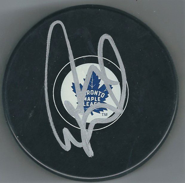 Autographed LEO KOMAROV Toronto Maple Leafs Hockey Puck
