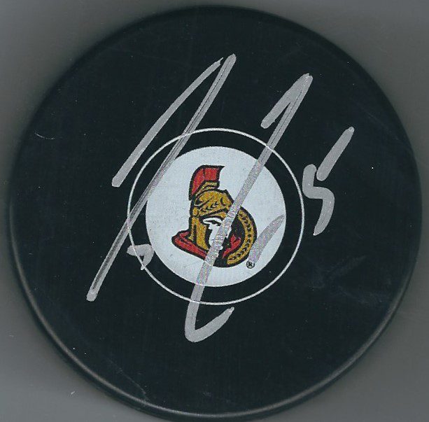 Autographed CODY CECI Ottawa Senators Hockey Puck