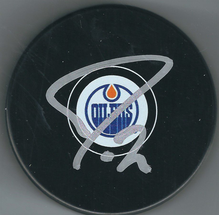 Autographed JORDAN EBERLE Edmonton Oilers Hockey Puck