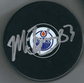 Autographed MATT BENNING Edmonton Oilers Hockey Puck