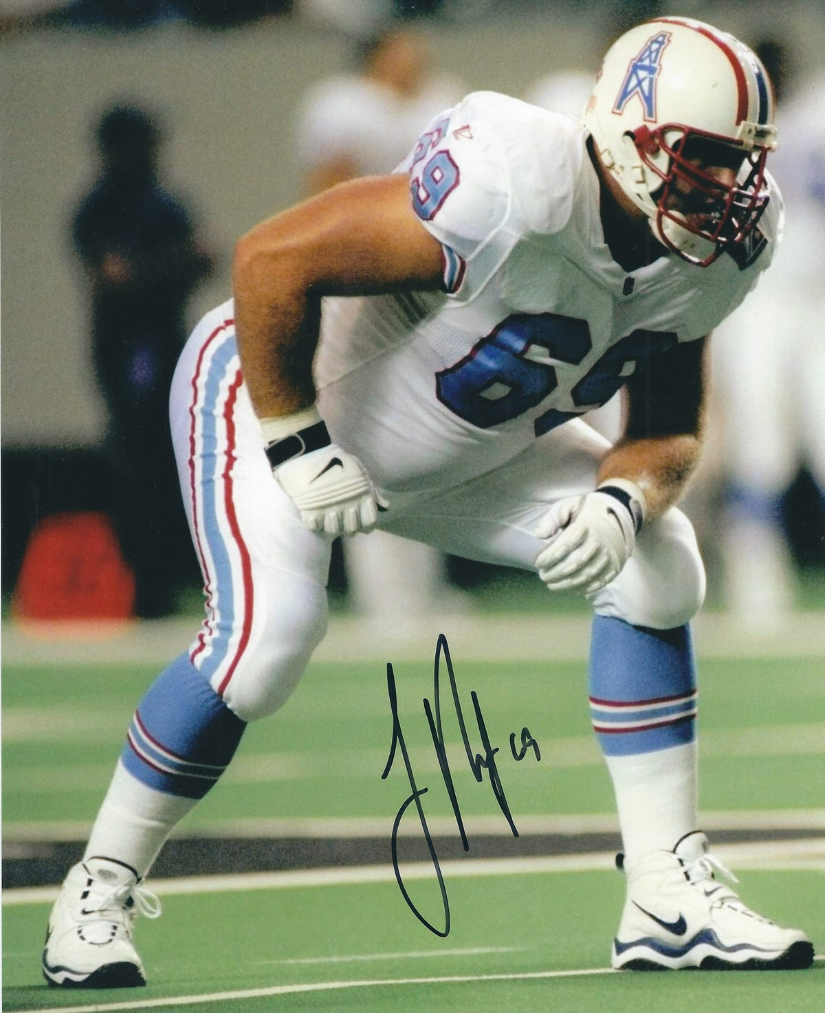 Autographed JON RUNYAN 8X10 Houston Oilers photo