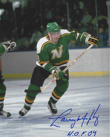 Autographed  LARRY MURPHY "HOF 04" 8X10 Minnesota North Stars photo.