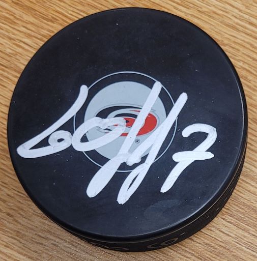 Autographed DMITRY ORLOV Carolina Hurricanes Hockey Puck