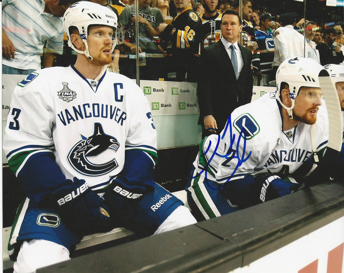 Autographed Daniel Sedin Vancouver Canucks Photos
